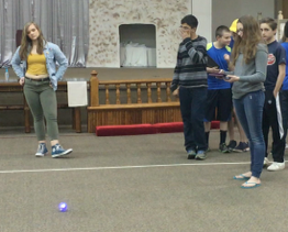 students testing their code on the sphero